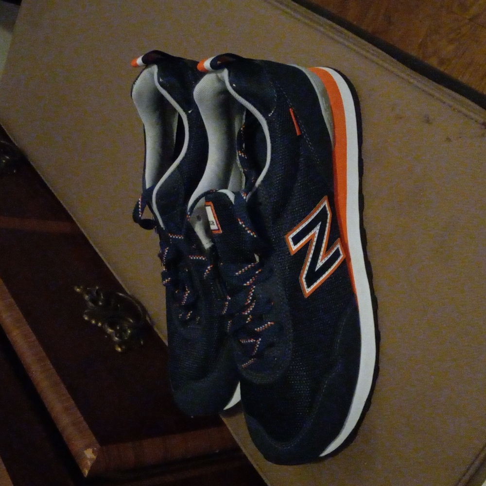 Men's size 11.5 New Balance Blue orange and white